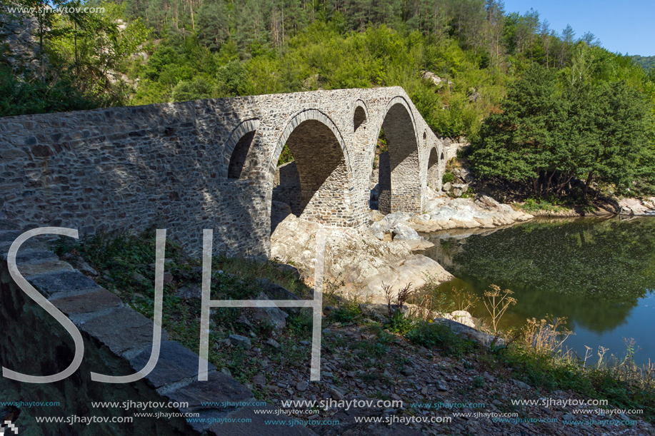 Amazing Reflection of Devil"s Bridge in Arda river and Rhodopes mountain, Kardzhali Region, Bulgaria