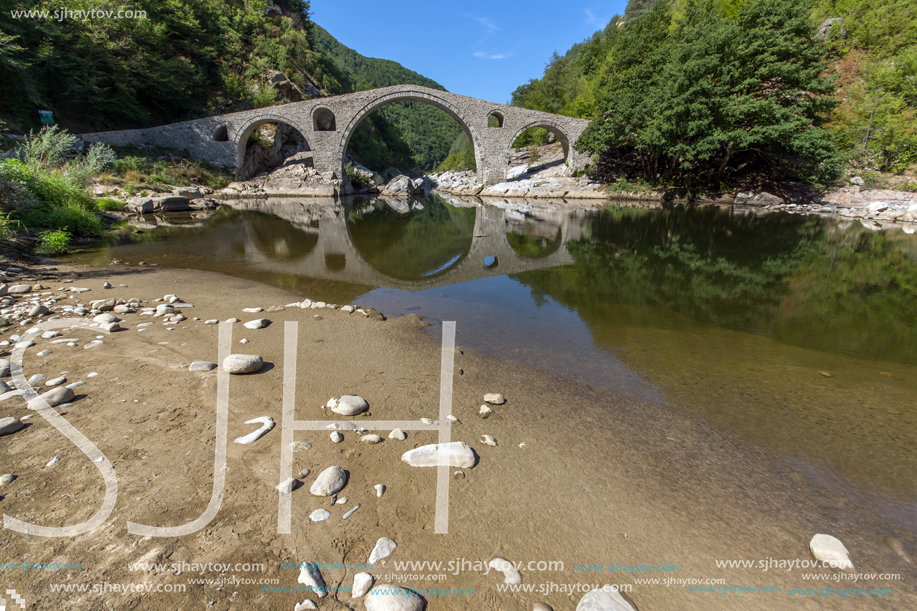 Amazing Reflection of Devil"s Bridge in Arda river and Rhodopes mountain, Kardzhali Region, Bulgaria