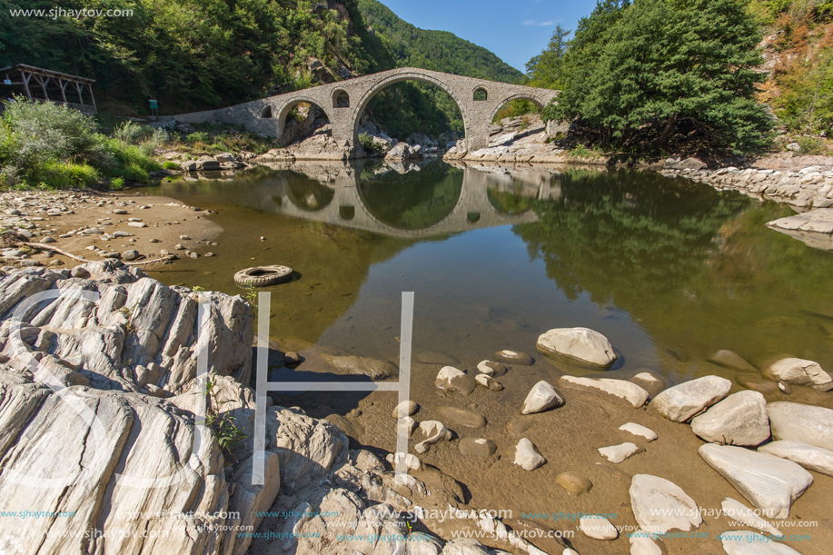 Amazing Reflection of Devil"s Bridge in Arda river and Rhodopes mountain, Kardzhali Region, Bulgaria