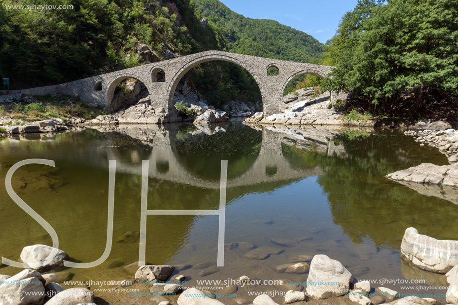 Amazing Reflection of Devil"s Bridge in Arda river and Rhodopes mountain, Kardzhali Region, Bulgaria