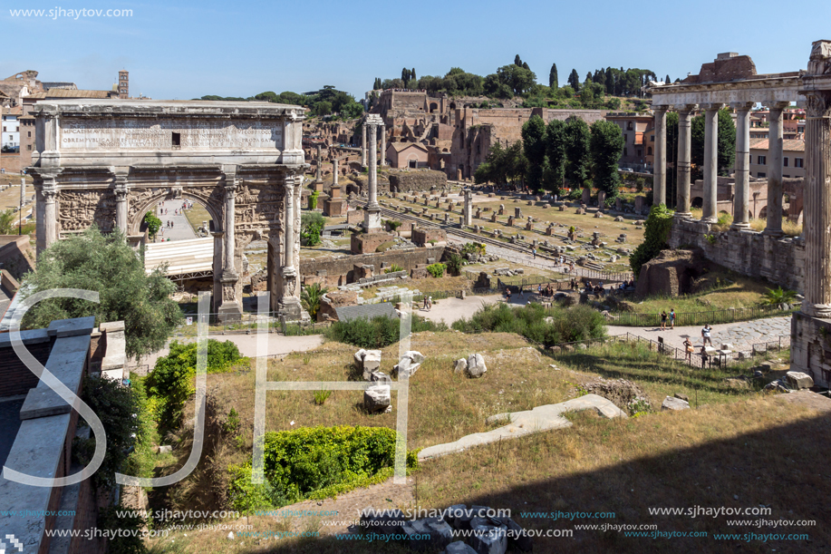 ROME, ITALY - JUNE 23, 2017: Ruins of Septimius Severus Arch and Roman Forum in city of Rome, Italy