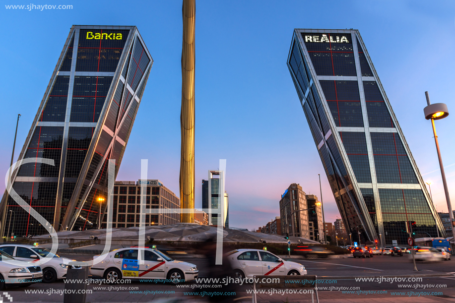 MADRID, SPAIN - JANUARY 23, 2018:  Sunrise view of Gate of Europe (KIO Towers) at Paseo de la Castellana street in City of Madrid, Spain