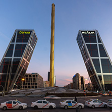 MADRID, SPAIN - JANUARY 23, 2018:  Sunrise view of Gate of Europe (KIO Towers) at Paseo de la Castellana street in City of Madrid, Spain