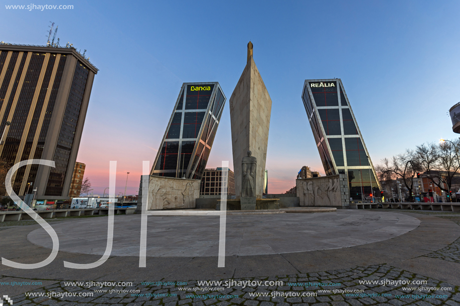 MADRID, SPAIN - JANUARY 23, 2018:  Sunrise view of Gate of Europe (KIO Towers) at Paseo de la Castellana street in City of Madrid, Spain