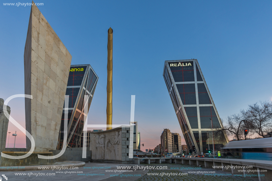 MADRID, SPAIN - JANUARY 23, 2018:  Sunrise view of Gate of Europe (KIO Towers) at Paseo de la Castellana street in City of Madrid, Spain