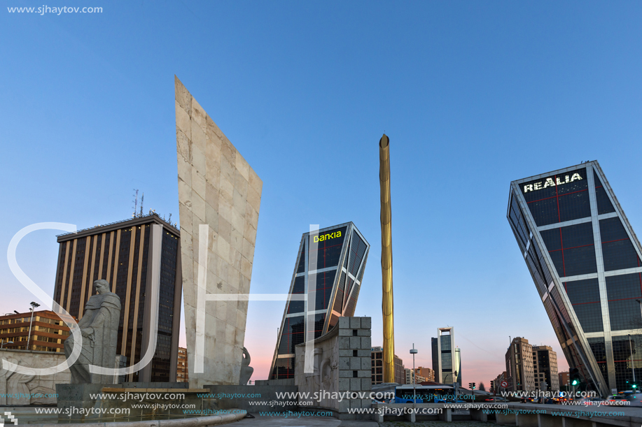 MADRID, SPAIN - JANUARY 23, 2018:  Sunrise view of Gate of Europe (KIO Towers) at Paseo de la Castellana street in City of Madrid, Spain
