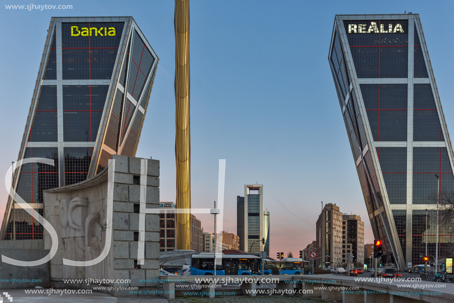 MADRID, SPAIN - JANUARY 23, 2018:  Sunrise view of Gate of Europe (KIO Towers) at Paseo de la Castellana street in City of Madrid, Spain