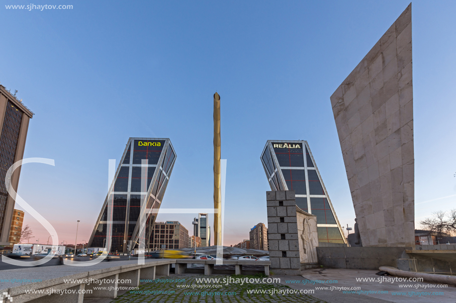 MADRID, SPAIN - JANUARY 23, 2018:  Sunrise view of Gate of Europe (KIO Towers) at Paseo de la Castellana street in City of Madrid, Spain