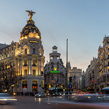 MADRID, SPAIN - JANUARY 23, 2018:  Sunset view of Gran Via and Metropolis Building in City of Madrid, Spain