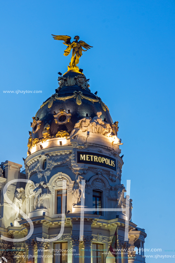MADRID, SPAIN - JANUARY 23, 2018:  Sunset view of Gran Via and Metropolis Building in City of Madrid, Spain