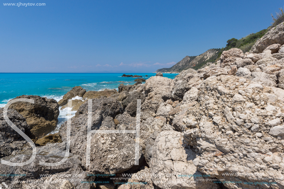 Amazing seascape of blue waters of Megali Petra Beach, Lefkada, Ionian Islands, Greece