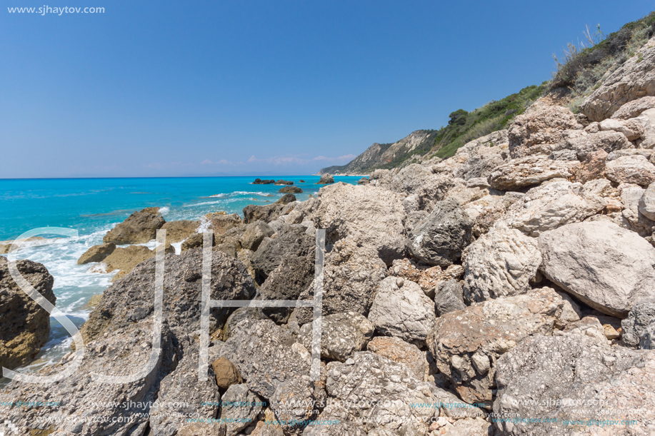 Amazing seascape of blue waters of Megali Petra Beach, Lefkada, Ionian Islands, Greece