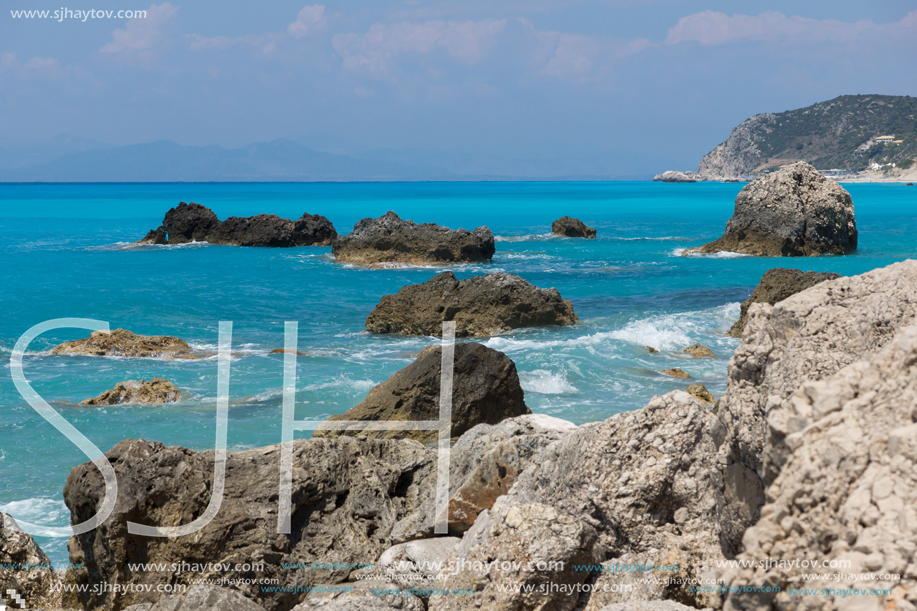 Amazing seascape of blue waters of Megali Petra Beach, Lefkada, Ionian Islands, Greece