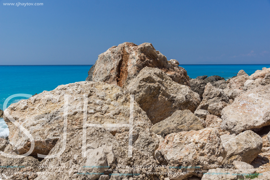 Amazing seascape of blue waters of Megali Petra Beach, Lefkada, Ionian Islands, Greece