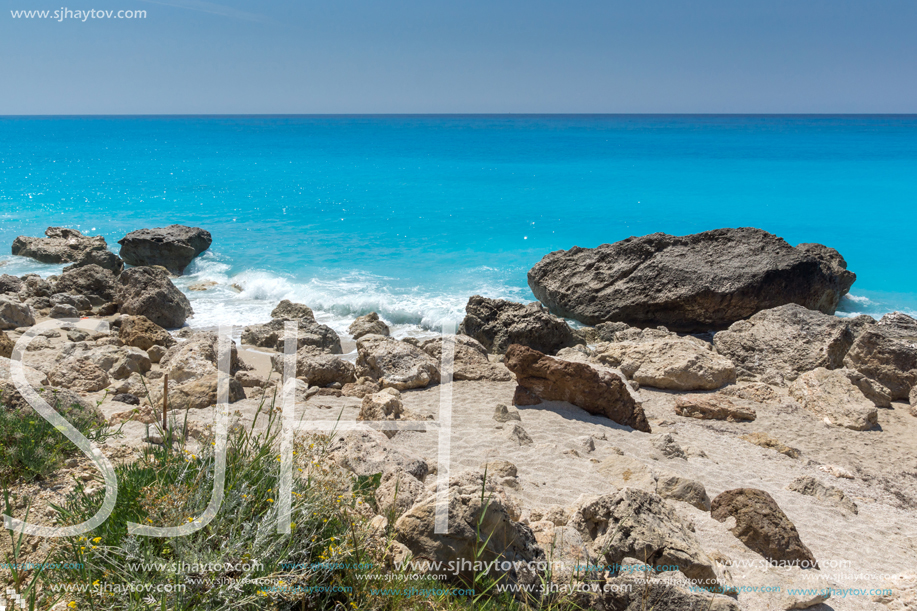 Amazing seascape of blue waters of Megali Petra Beach, Lefkada, Ionian Islands, Greece