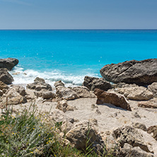 Amazing seascape of blue waters of Megali Petra Beach, Lefkada, Ionian Islands, Greece