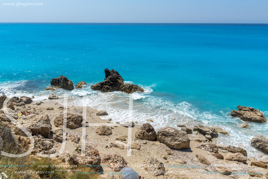 Amazing seascape of blue waters of Megali Petra Beach, Lefkada, Ionian Islands, Greece