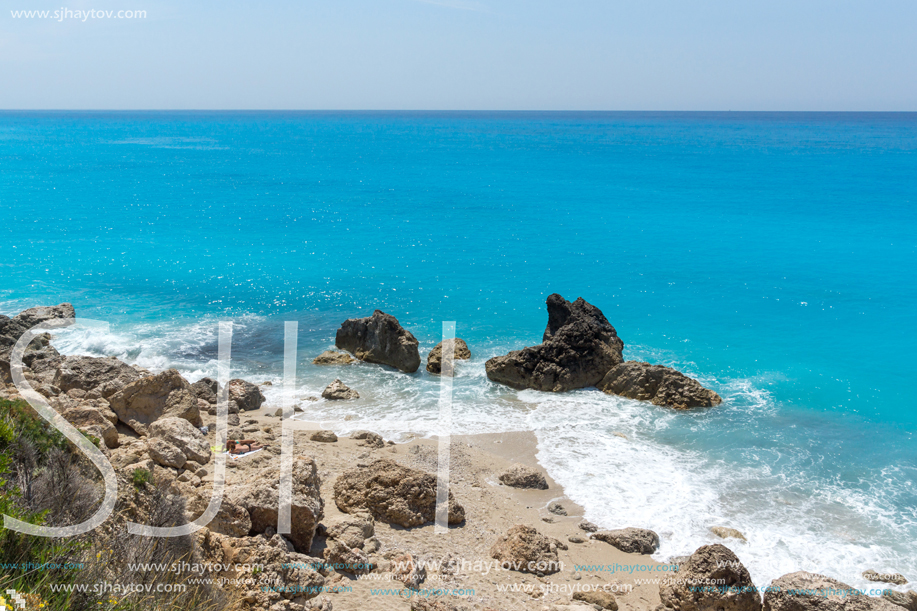 Amazing seascape of blue waters of Megali Petra Beach, Lefkada, Ionian Islands, Greece