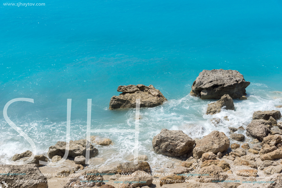 Amazing seascape of blue waters of Megali Petra Beach, Lefkada, Ionian Islands, Greece