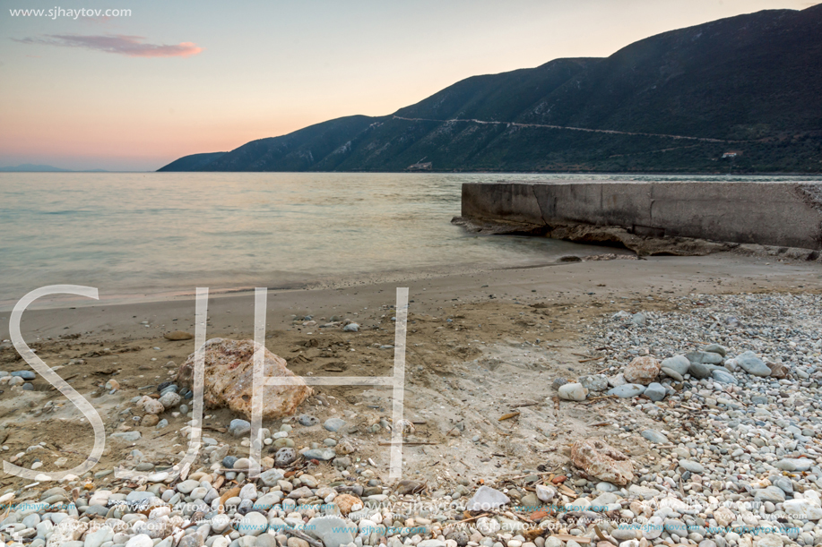 Amazing sunset on the beach of village of Vasiliki, Lefkada, Ionian Islands, Greece