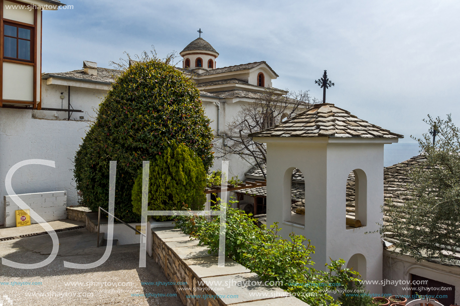 Church and spring flowers in Archangel Michael Monastery in Thassos island, East Macedonia and Thrace, Greece
