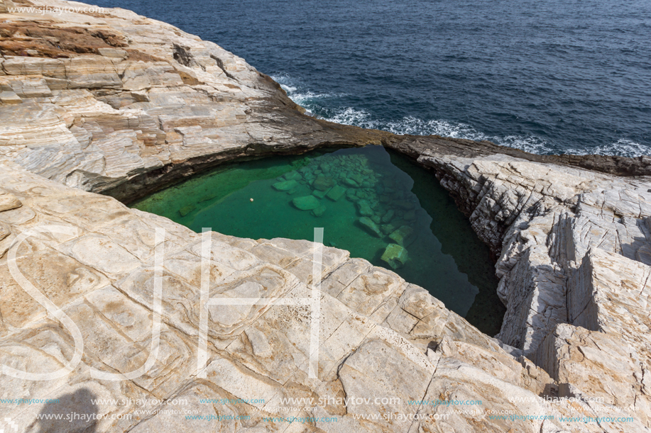 Green waters of Giola Natural Pool in Thassos island, East Macedonia and Thrace, Greece