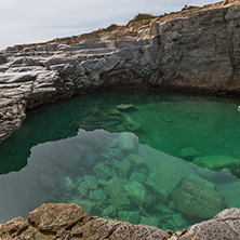 Green waters of Giola Natural Pool in Thassos island, East Macedonia and Thrace, Greece