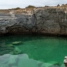 Green waters of Giola Natural Pool in Thassos island, East Macedonia and Thrace, Greece