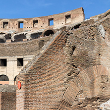 ROME, ITALY - JUNE 24, 2017: Tourists visiting inside part of  Colosseum in city of Rome, Italy