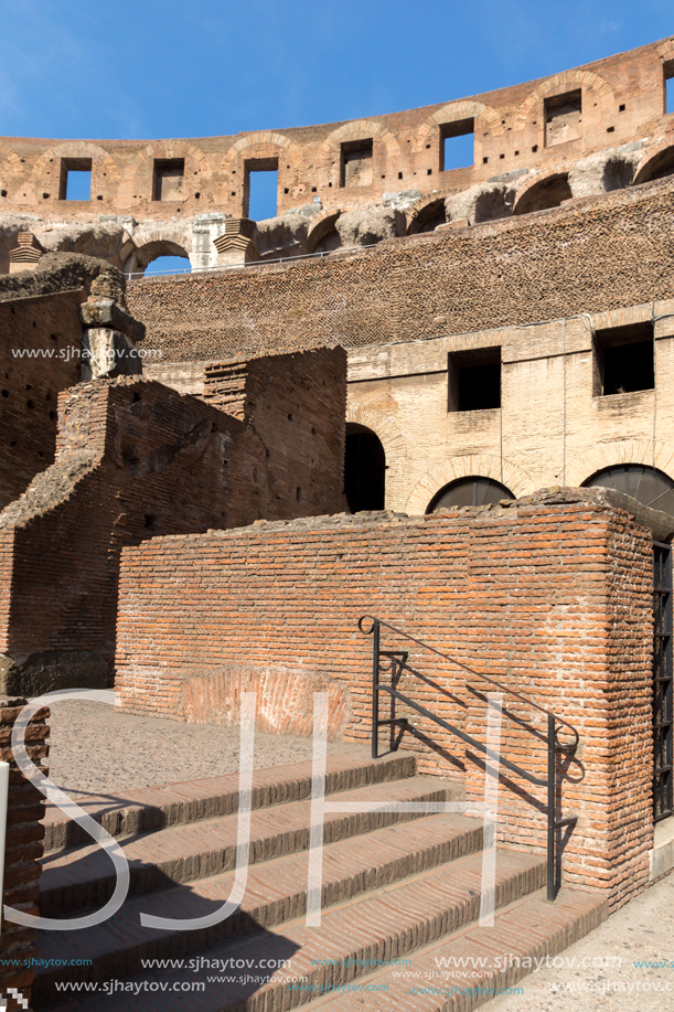 ROME, ITALY - JUNE 24, 2017: Tourists visiting inside part of  Colosseum in city of Rome, Italy