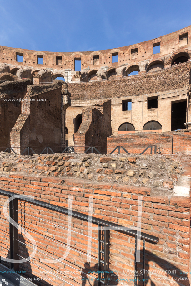 ROME, ITALY - JUNE 24, 2017: Tourists visiting inside part of  Colosseum in city of Rome, Italy