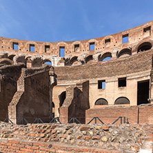 ROME, ITALY - JUNE 24, 2017: Tourists visiting inside part of  Colosseum in city of Rome, Italy