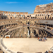 ROME, ITALY - JUNE 24, 2017: Tourists visiting inside part of  Colosseum in city of Rome, Italy