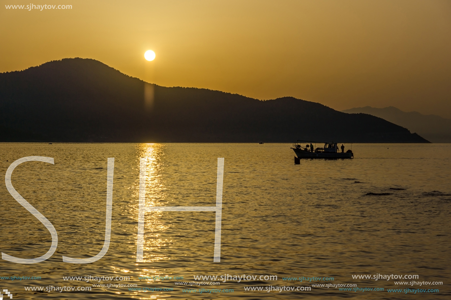 Sunset view on embankment of Thassos town, East Macedonia and Thrace, Greece