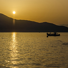 Sunset view on embankment of Thassos town, East Macedonia and Thrace, Greece