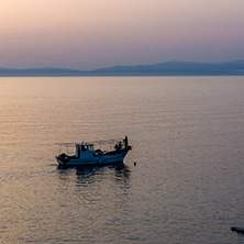 Sunset view on embankment of Thassos town, East Macedonia and Thrace, Greece