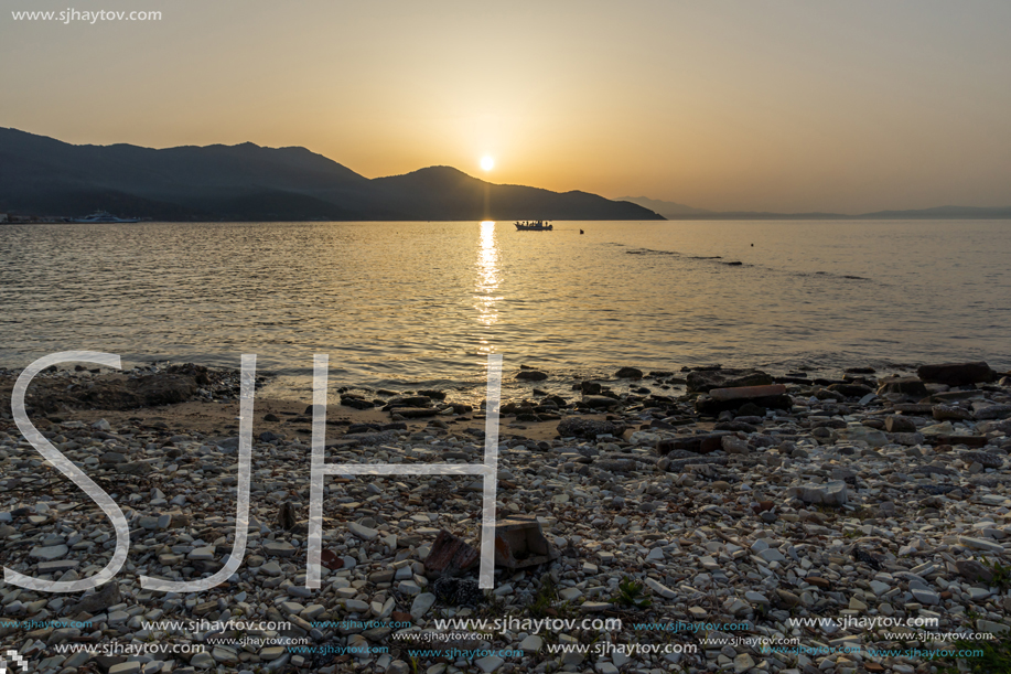 Sunset view on embankment of Thassos town, East Macedonia and Thrace, Greece