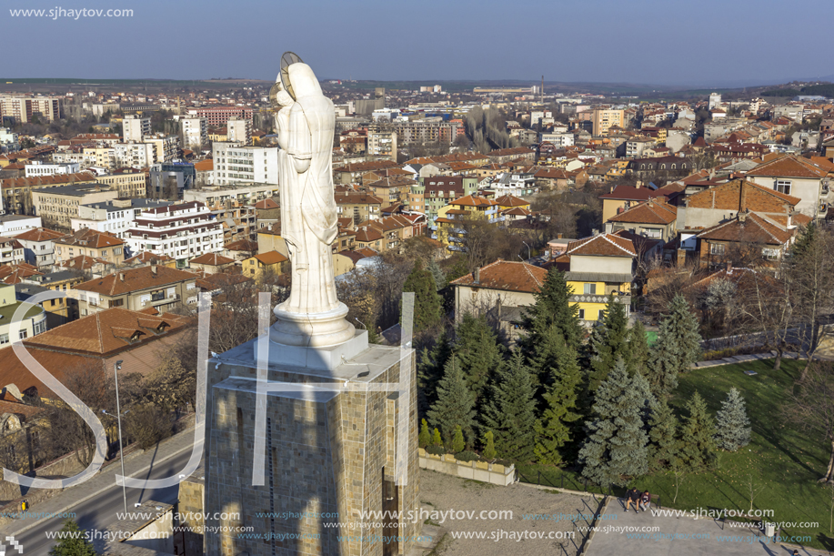 HASKOVO, BULGARIA - MARCH 15, 2014: The biggest Monument of Virgin Mary in the world and panorama to City of Haskovo, Bulgaria