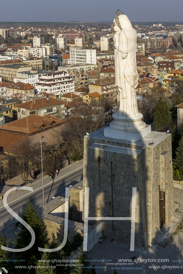 HASKOVO, BULGARIA - MARCH 15, 2014: The biggest Monument of Virgin Mary in the world and panorama to City of Haskovo, Bulgaria