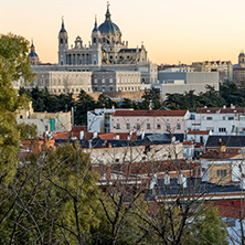 MADRID, SPAIN - JANUARY 21, 2018:  Sunset view of Royal Palace and Almudena Cathedral in City of Madrid, Spain