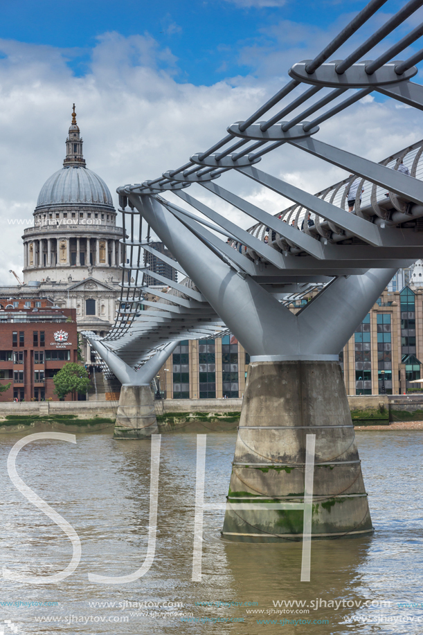 LONDON, ENGLAND - JUNE 15 2016: St. Paul"s Cathedral and Millennium bridge, London, England, Great Britain