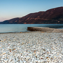 Sunset view on the beach of village of Vasiliki, Lefkada, Ionian Islands, Greece