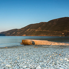Sunset view on the beach of village of Vasiliki, Lefkada, Ionian Islands, Greece
