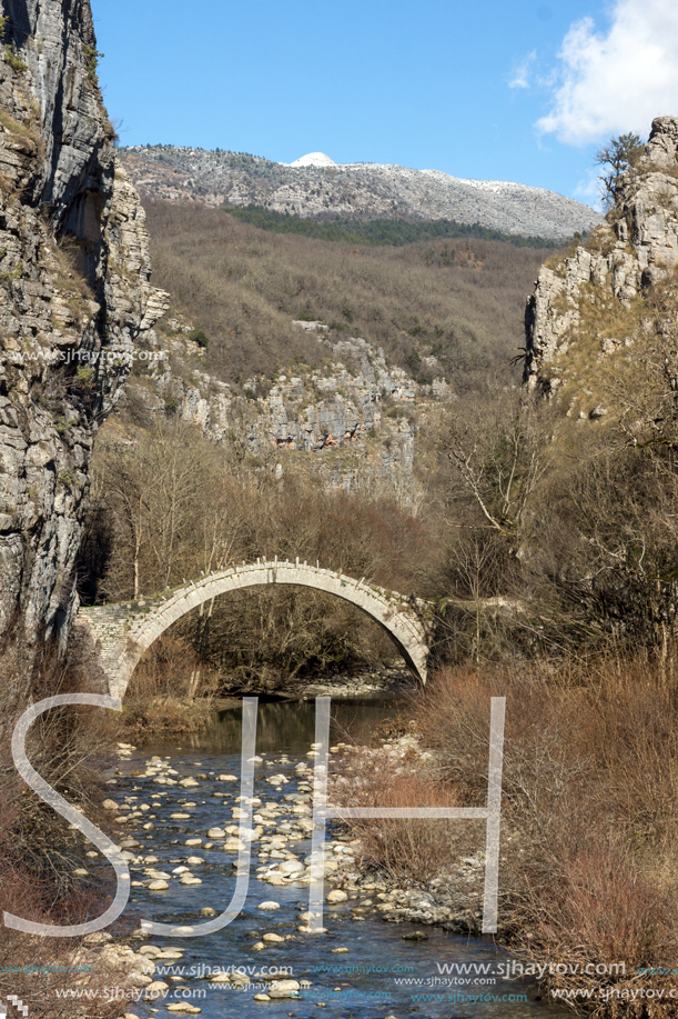 Amazing landscape of Bridge of Kontodimos or Lazaridis in Vikos gorge and Pindus Mountains, Zagori, Epirus, Greece