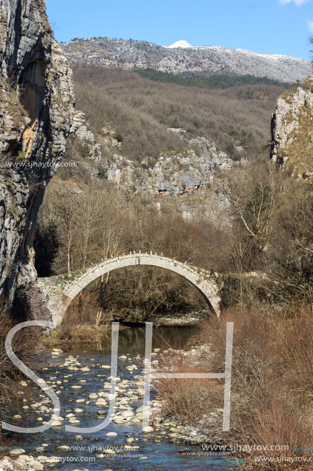 Amazing landscape of Bridge of Kontodimos or Lazaridis in Vikos gorge and Pindus Mountains, Zagori, Epirus, Greece