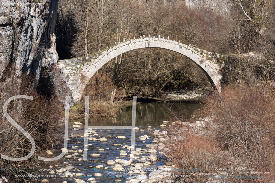 Amazing landscape of Bridge of Kontodimos or Lazaridis in Vikos gorge and Pindus Mountains, Zagori, Epirus, Greece