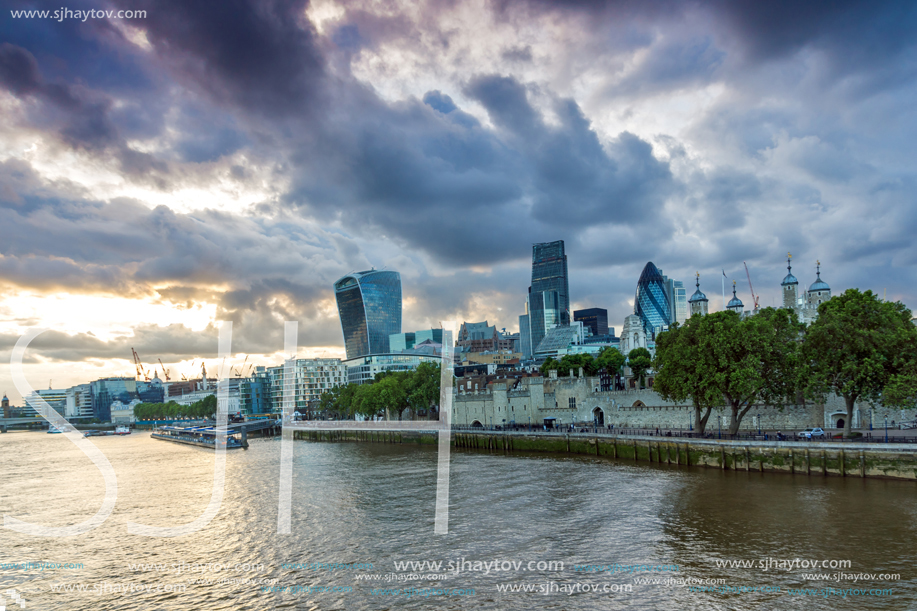 LONDON, ENGLAND - JUNE 15, 2016: Sunset Skyline of London From Tower Bridge, England, United Kingdom