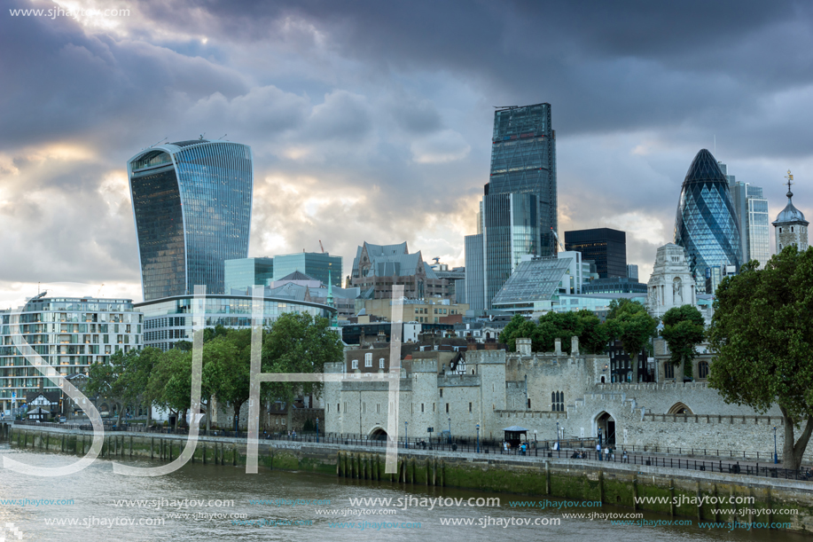 LONDON, ENGLAND - JUNE 15, 2016:  Sunset Skyline of London From Tower Bridge, England, United Kingdom