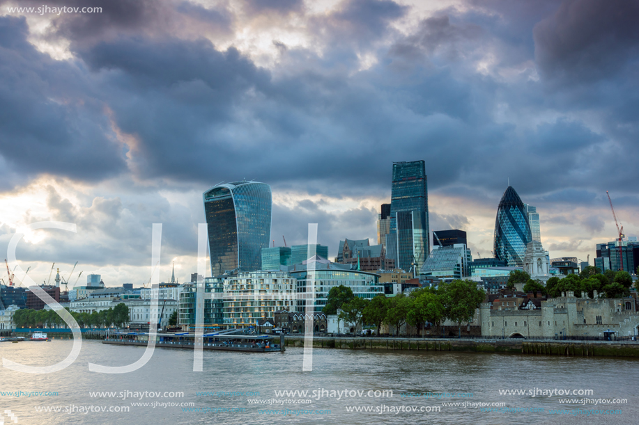 LONDON, ENGLAND - JUNE 15, 2016: Sunset Skyline of London From Tower Bridge, England, United Kingdom