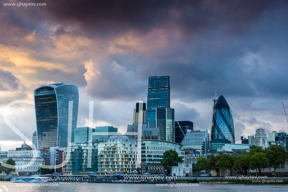 LONDON, ENGLAND - JUNE 15, 2016: Sunset Skyline of London From Tower Bridge, England, United Kingdom